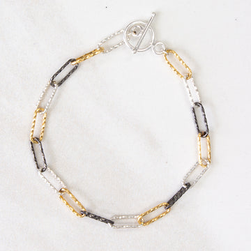 Mixed metal sparkle link toggle bracelet