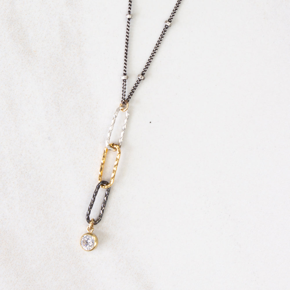 Mixed metal sparkle link necklace with cz drop